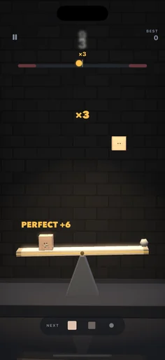 Teeter: a perfect drop on the beam, the next pieces waiting below.